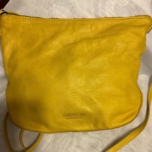 Small leather yellow cross body bag